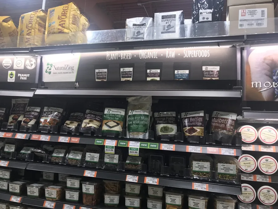 Natural Zing raw superfoods on a premium retail shelf